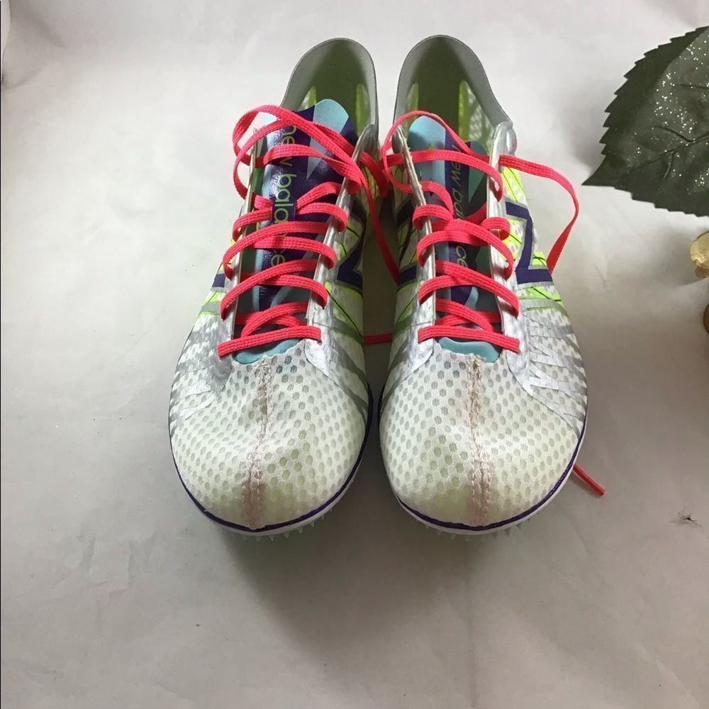 New Balance lime green and white bike racing shoes size 11.